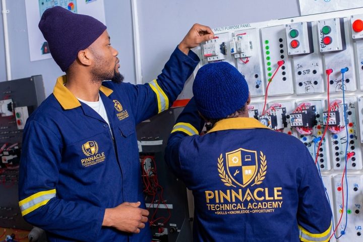 Electrician students wiring an electrical control panel at Pinnacle Technical Academy Johannesburg