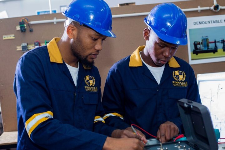Students testing an appliance motor with a multimeter at Pinnacle Technical Academy Johannesburg