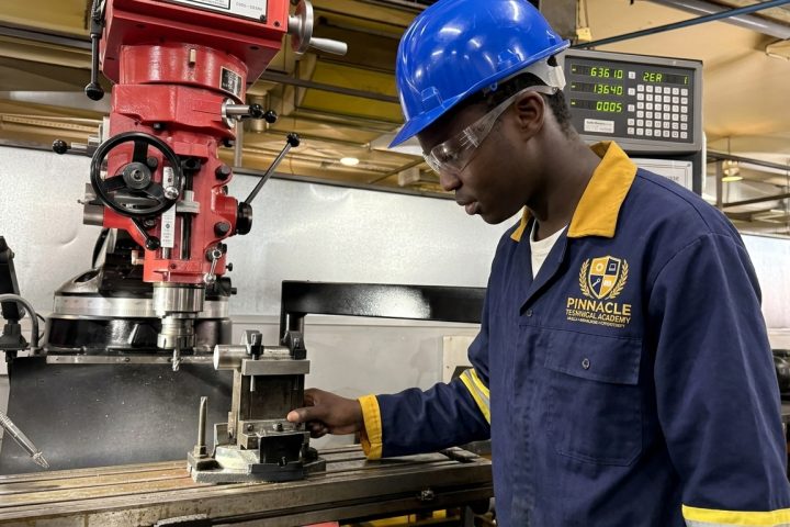 Engineering student setting up a milling machine at Pinnacle Technical Academy Johannesburg